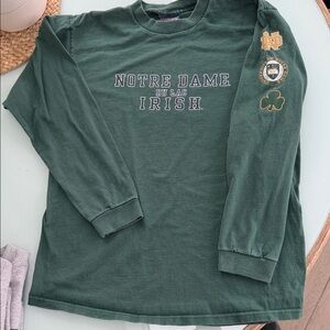Jansport Notre Dame Irish Long Sleeve Tee in Dark Green with Gold Accents